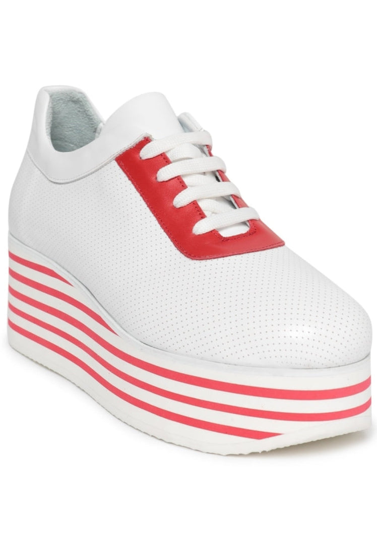 A pair of trendy red and white striped platform high top sneakers.