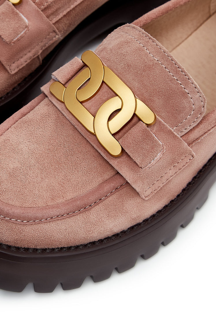 A trendy pair of women's pink suede chunky loafers with a stylish golden chain detail.