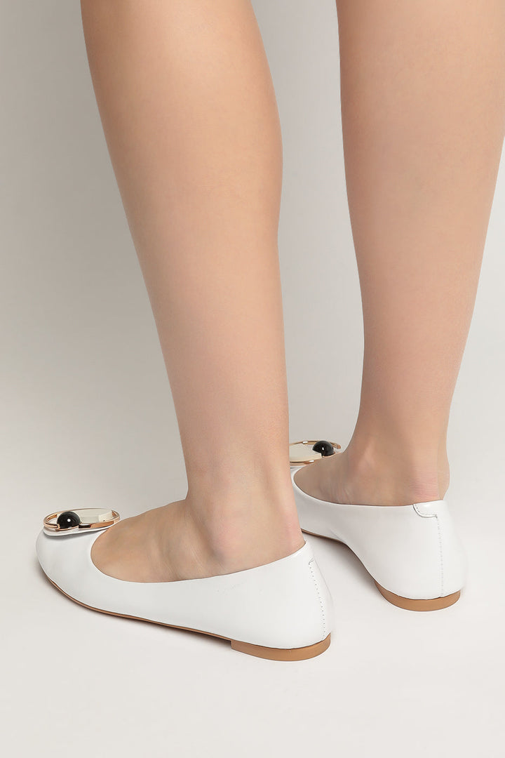 A pair of modern ballet flats with a stylish geometric design in white, showcasing fashionable and contemporary dance footwear.