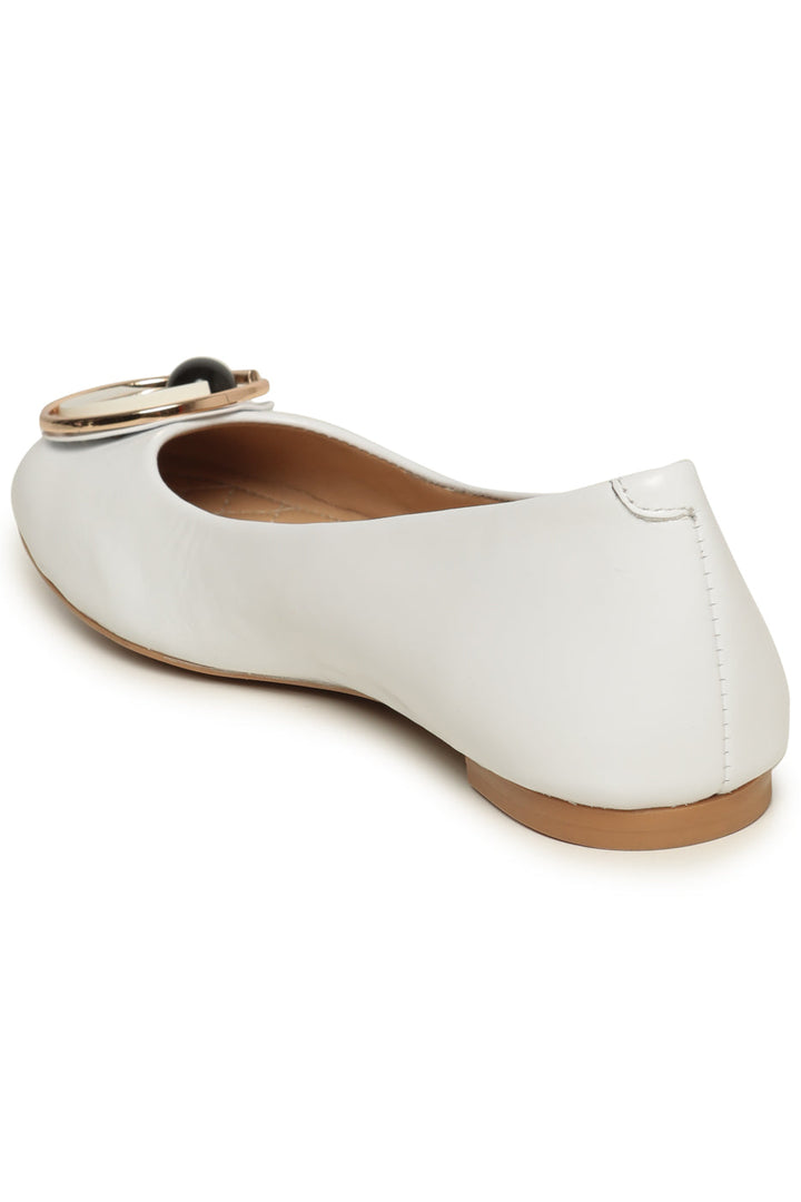 A trendy pair of modern ballet flats with a geometric design, in white, perfect fashionable footwear for contemporary dance.