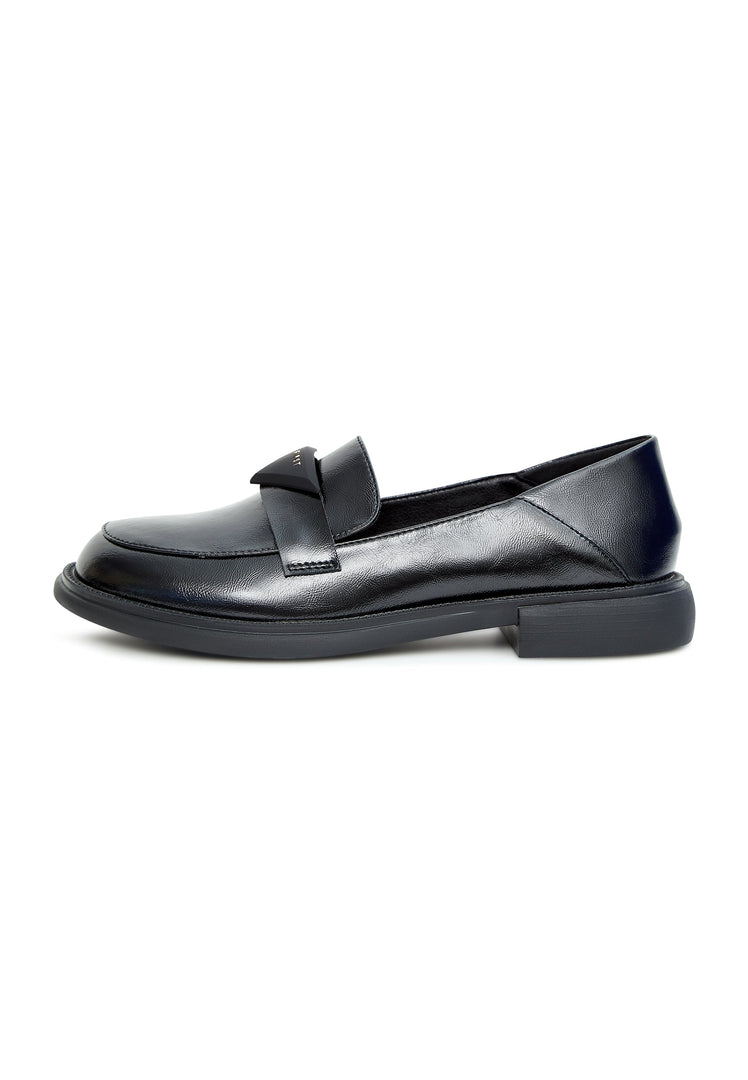 A stylish pair of black slip-on loafers for men, the epitome of classic and comfortable footwear.