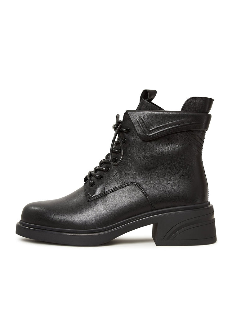 A chic pair of stylish black ankle boots with block heels, perfect for a trendy and fashionable look.