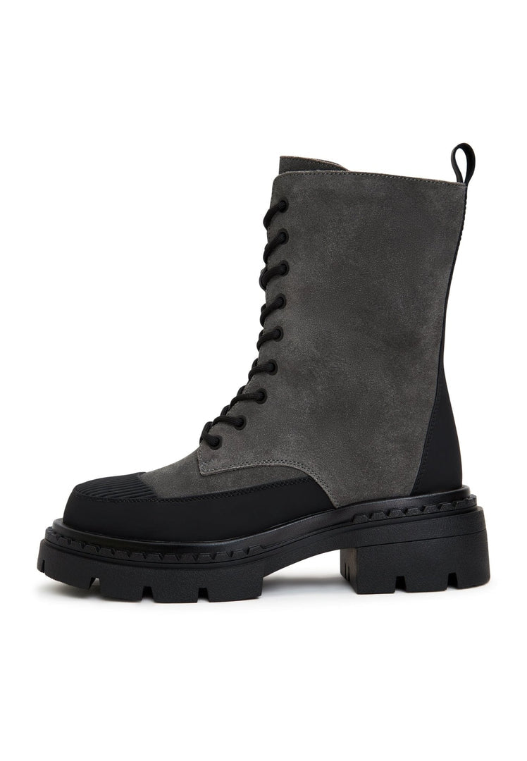 A stylish pair of grey lace-up ankle boots, the epitome of elegant footwear for women.