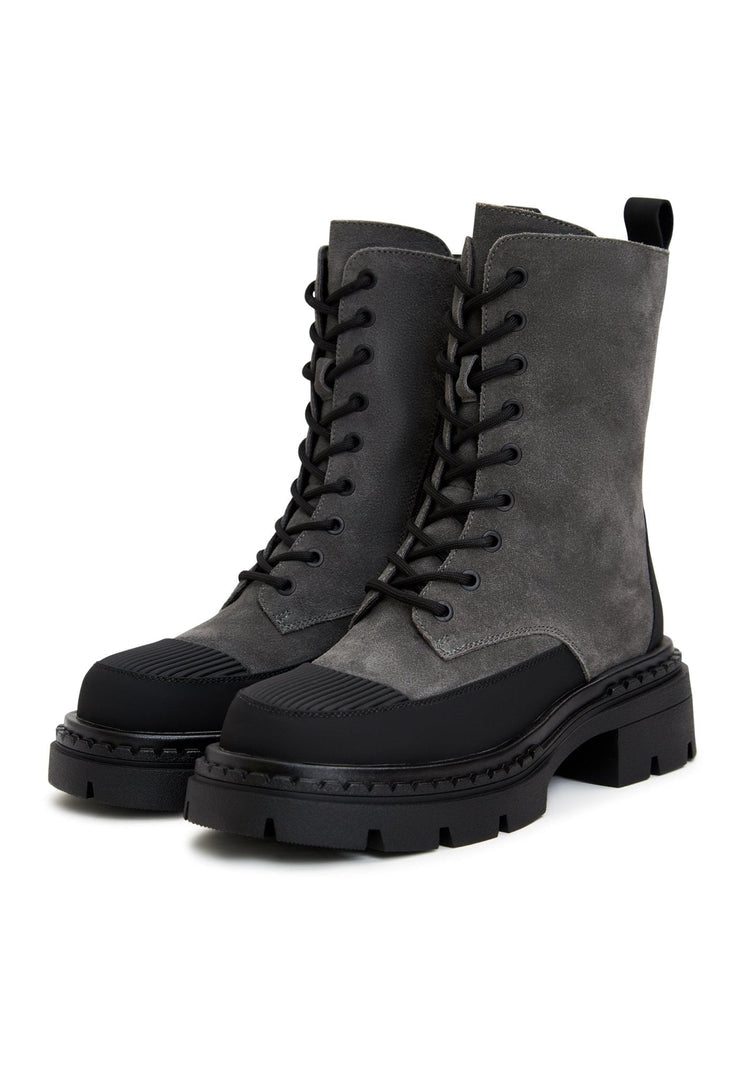 A stylish pair of women's lace-up ankle boots in grey, perfect for adding an elegant and fashionable touch to any outfit.