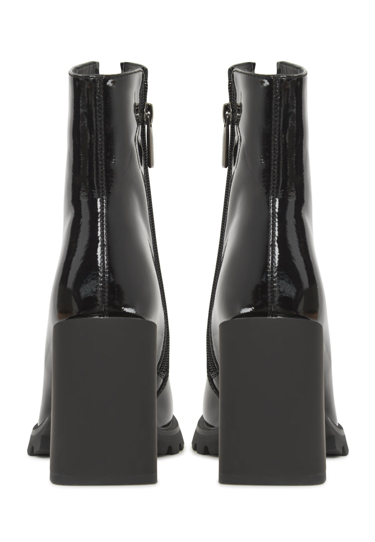 A stylish pair of women's black patent leather ankle boots - classic and versatile footwear.