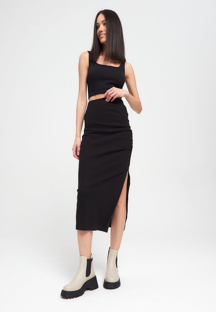 A stylish pair of women's fashion Chelsea boots in beige color, featuring a chunky platform design.