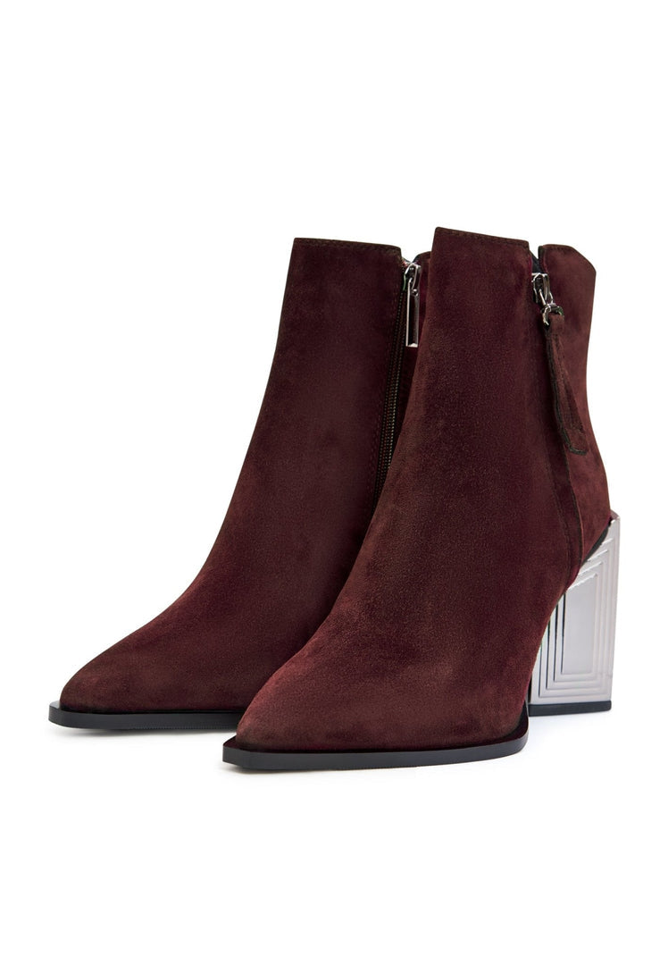 A pair of stylish classic leather ankle boots in Bordeaux for women, perfect for a fashion-forward look.