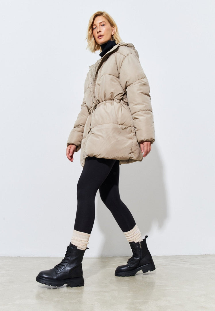 A pair of stylish black lace-up booties for women.