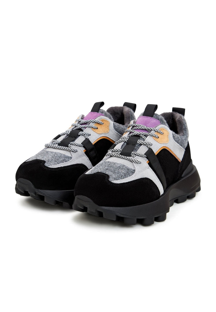 A pair of trendy chunky platform sneakers in grey, perfect for a fashionable look.