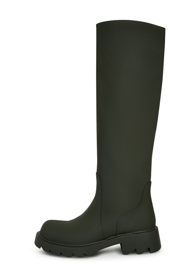A pair of trendy knee-high green boots with a chunky sole, perfect for women's fashion footwear.