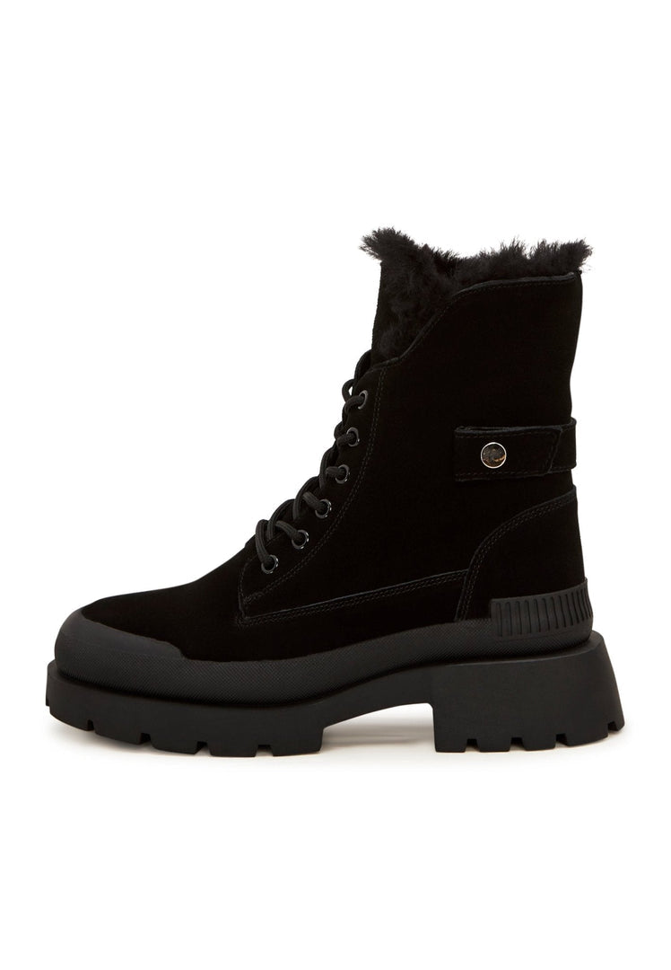 A pair of stylish black suede ankle boots, the epitome of fashionable and elegant suede footwear, perfect for those looking for sophisticated ankle booties.