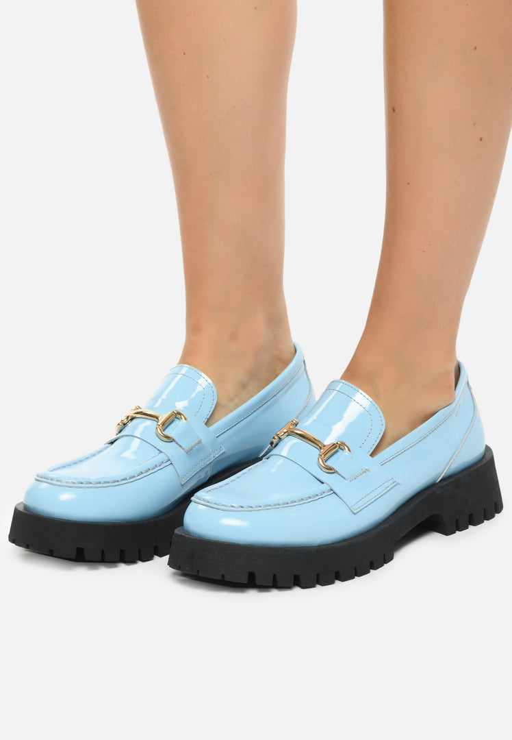 Step out in style with these luxurious Josephine Blue loafers featuring gold-bit detailing. Elevate your look with these luxe glide gold-bit loafers, the epitome of sophisticated blue loafers. Luxe footwear at its finest.