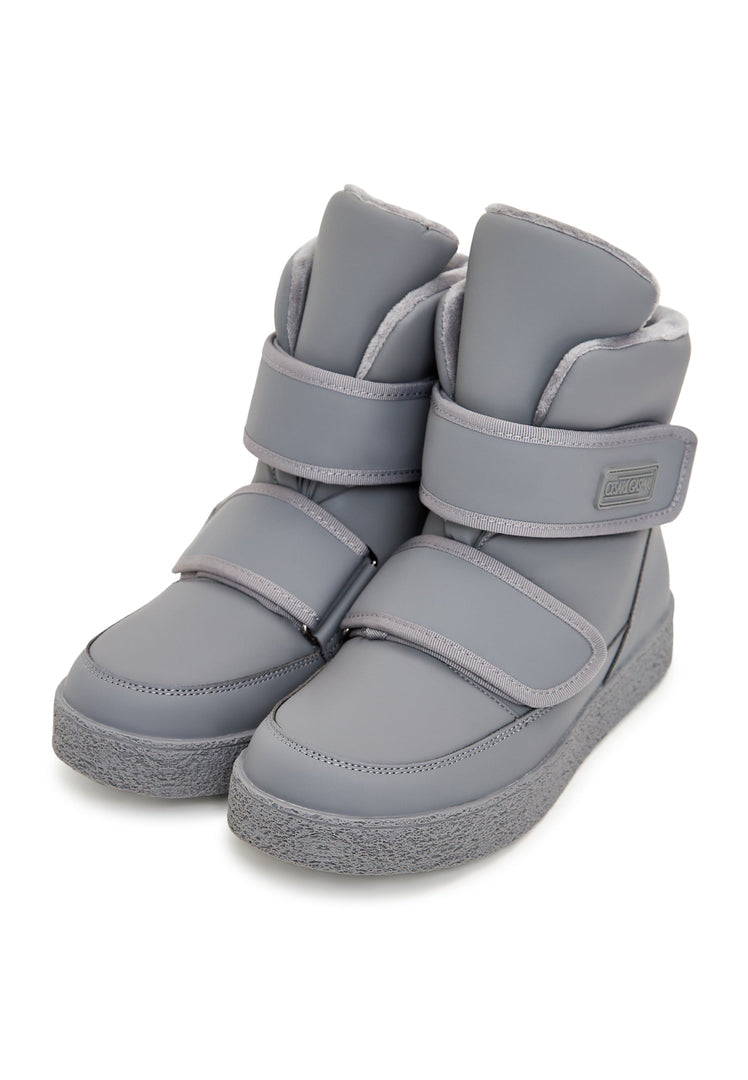 A pair of grey high-top winter boots with velcro straps, perfect for cold weather as your go-to winter footwear.