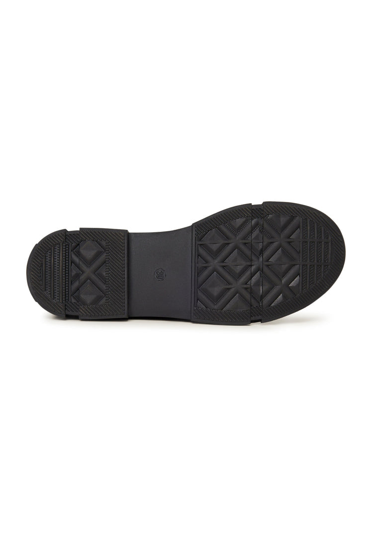 A stylish pair of black leather women's flat sole ankle boots with a trendy design, perfect for everyday wear.