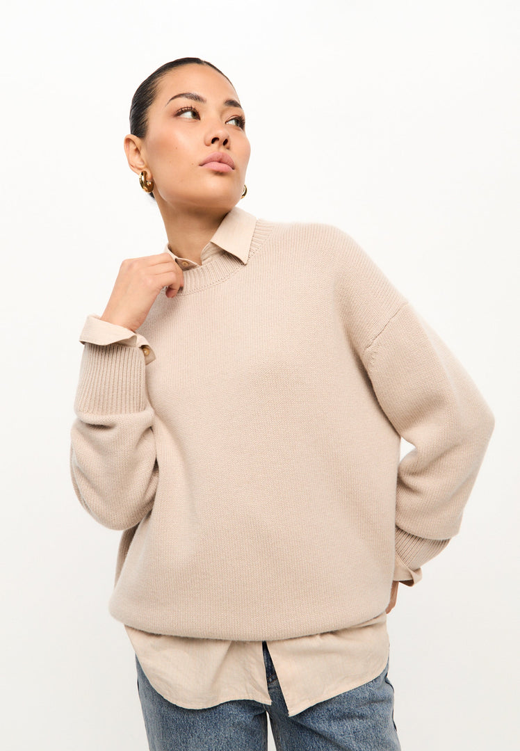 A stylish beige knit pullover, classic crew neck sweater inspired by Mulan, perfect for women's casual wear.