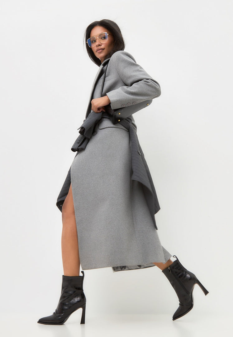 A pair of stylish women's high heel ankle boots in black, known as Tiana black boots, perfect for elevating any outfit.