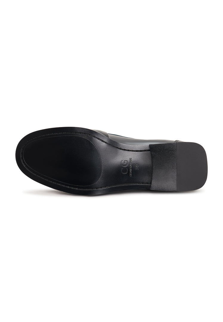 A pair of black patent Bagheera loafers adorned with shimmering crystals, perfect for adding a touch of glamour to any outfit.