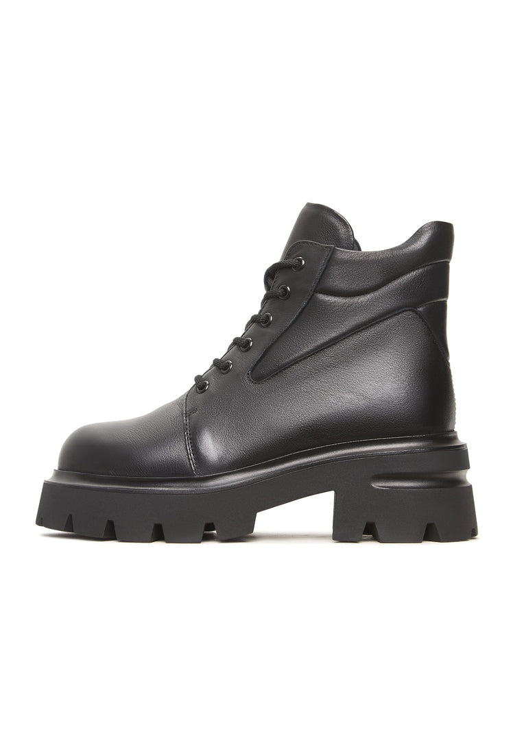 A sleek pair of black leather Freya ankle boots with platform and chunky heels.