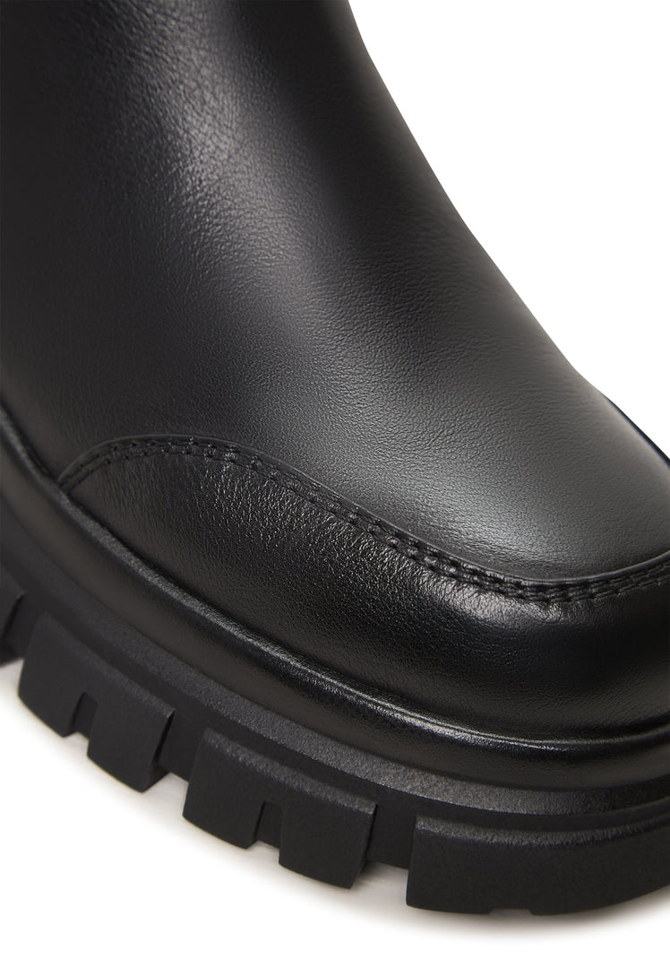 A stylish pair of black Göll ankle boots, a trendy choice for fashion-forward individuals.