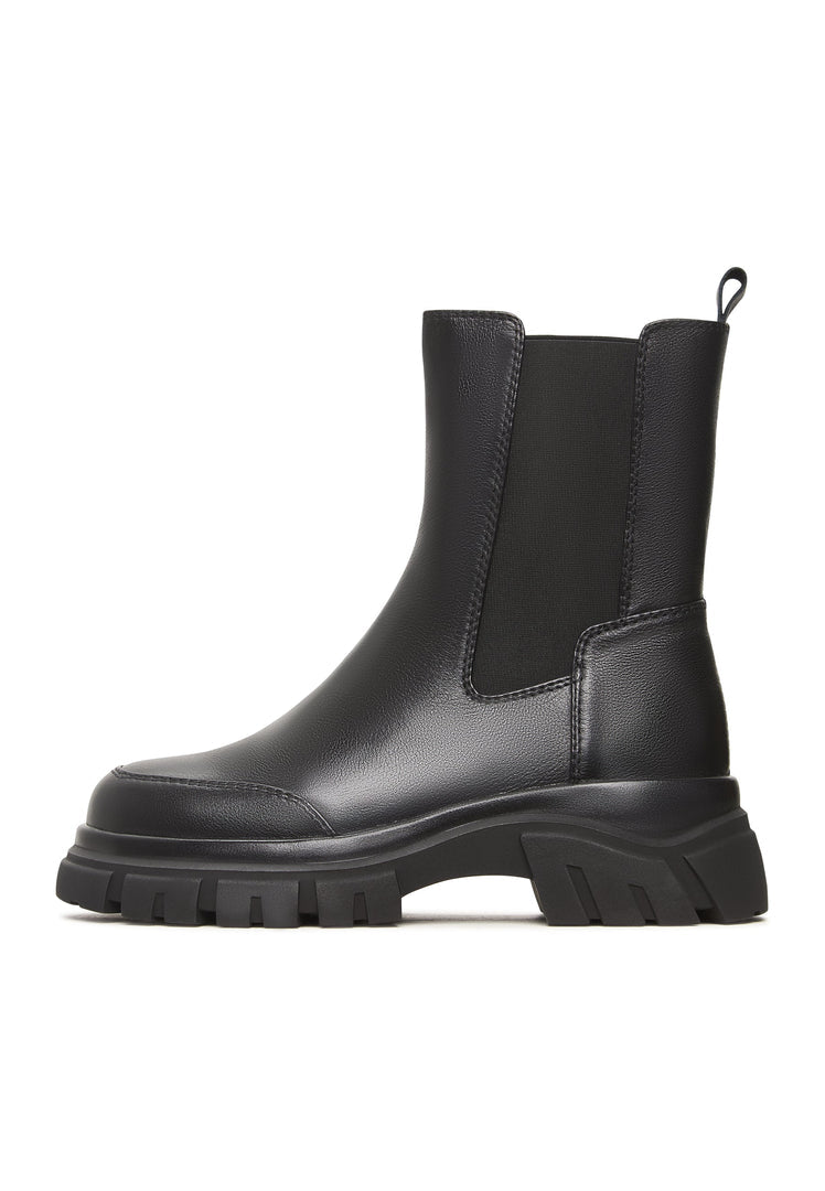 A stylish pair of black Göll ankle boots, perfect for adding a bold and fashionable touch to any outfit.
