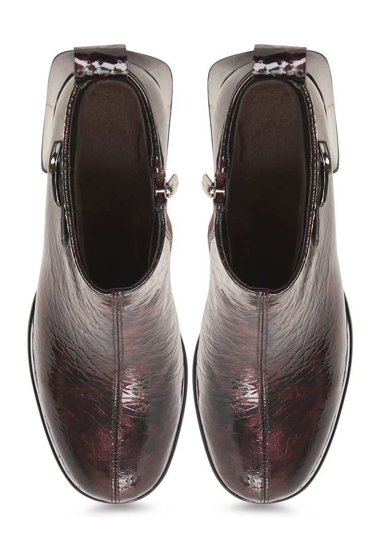 A stylish pair of women's Vika leather ankle boots in Bordeaux, featuring a sleek design.