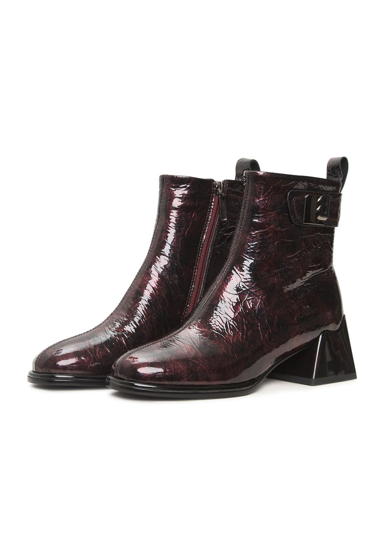 A beautiful pair of women's leather ankle boots in a rich bordeaux color, featuring a sleek design known as Vika boots.