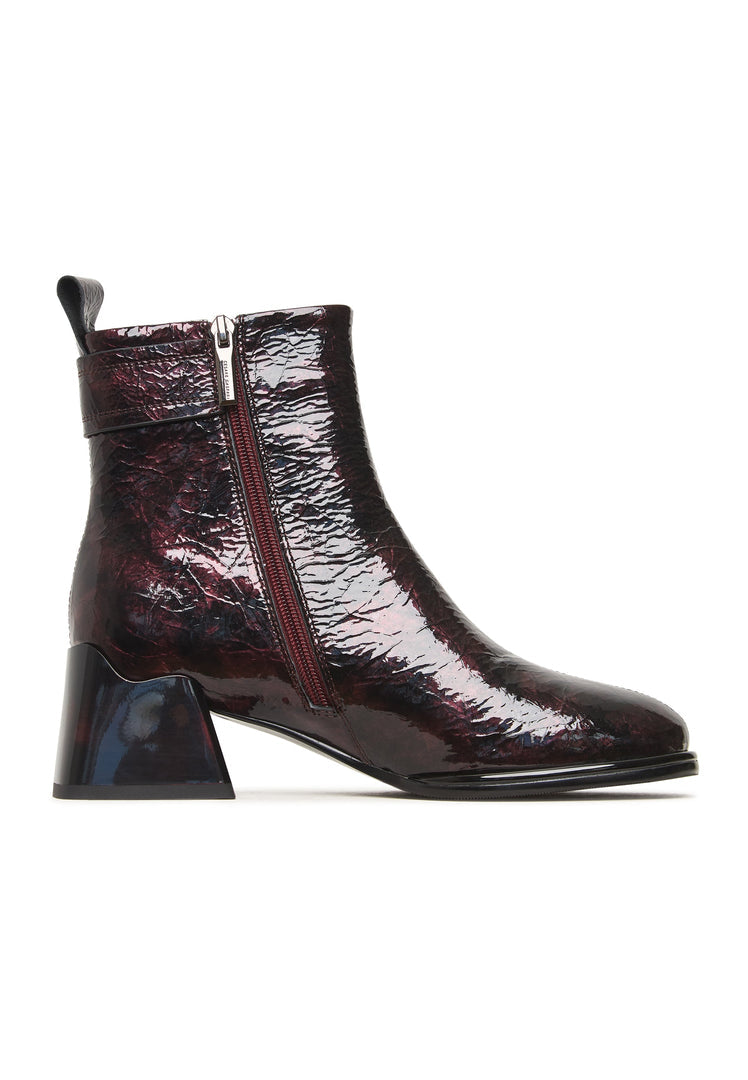 A sleek pair of Vika leather ankle boots in Bordeaux, perfect women's footwear for trendy outfits.