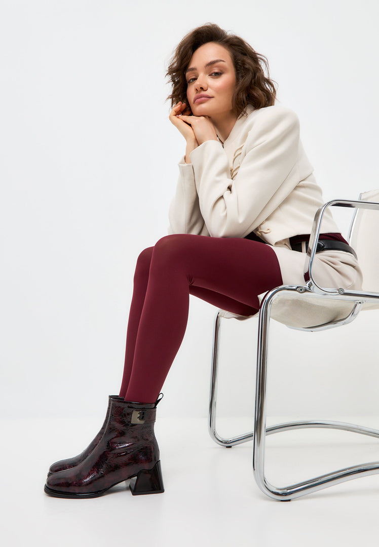 A pair of stylish women's Vika leather ankle boots in a sleek Bordeaux shade.