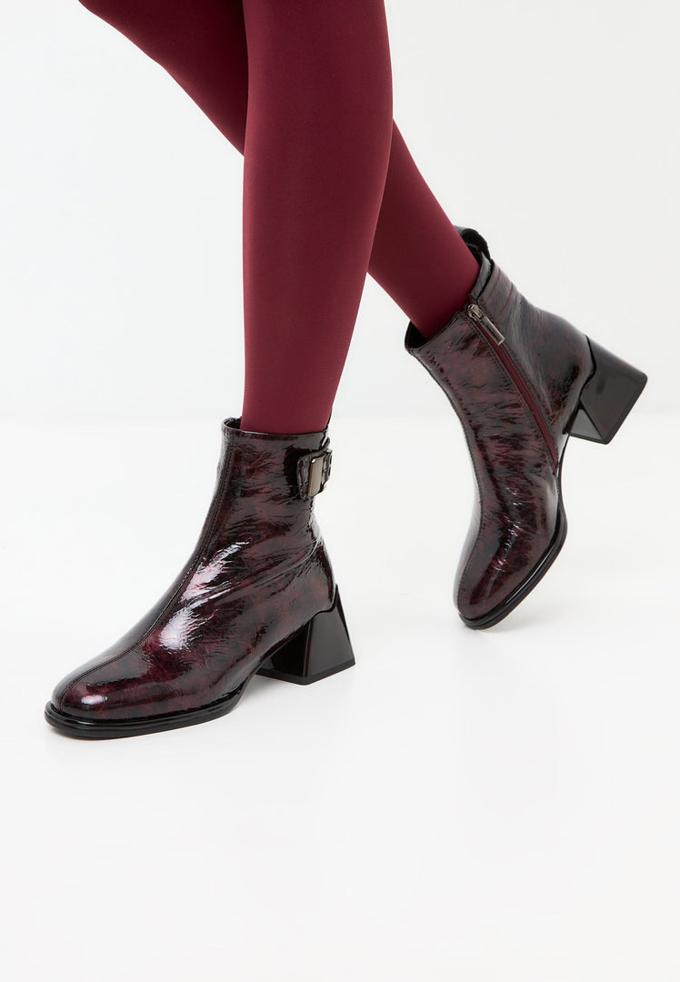 A pair of sleek Bordeaux Vika leather ankle boots, the perfect addition to any women's boot collection.