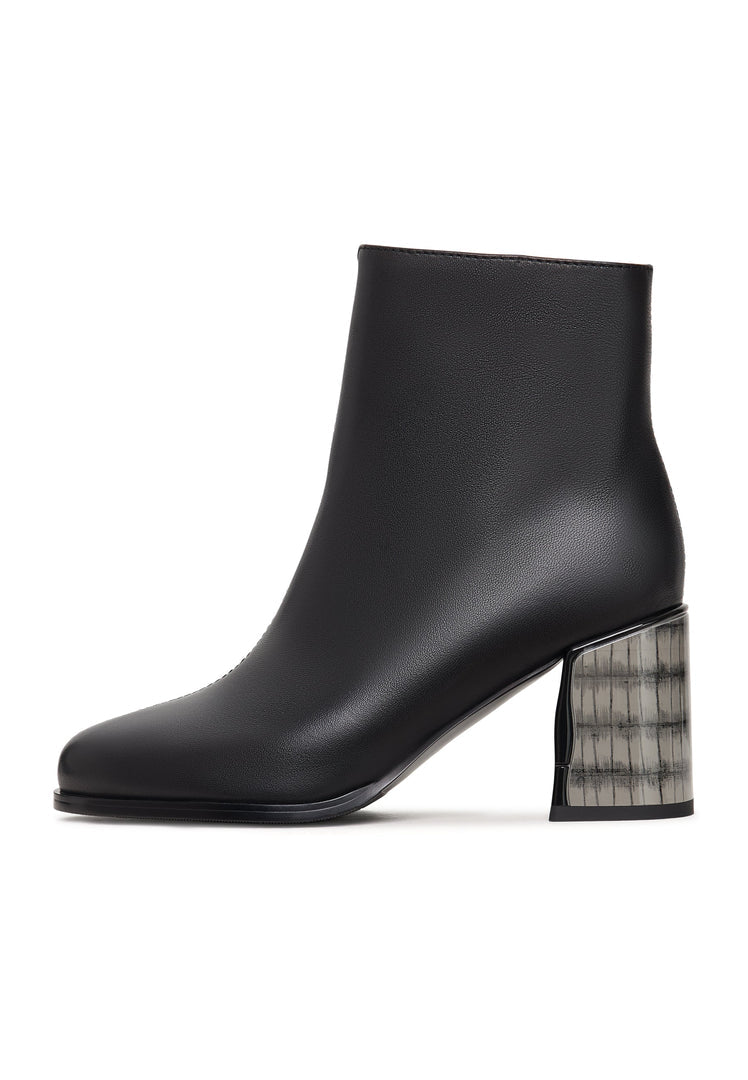 A pair of stylish black leather heel boots, known as Ella boots, made of soft leather, perfect for women's fashion.