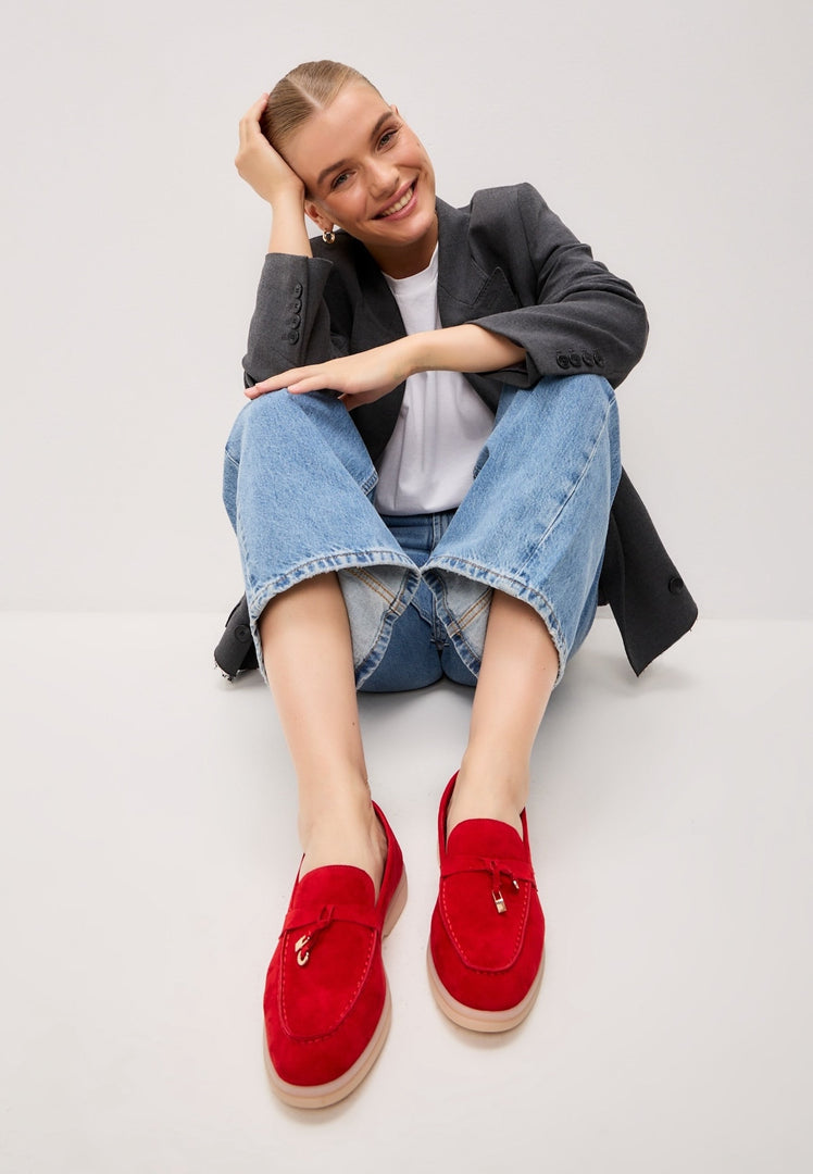 A pair of stylish red platform moccasins with a touch of elegance - the Aurelia moccasins, perfect as red moccasin shoes and platform loafers.
