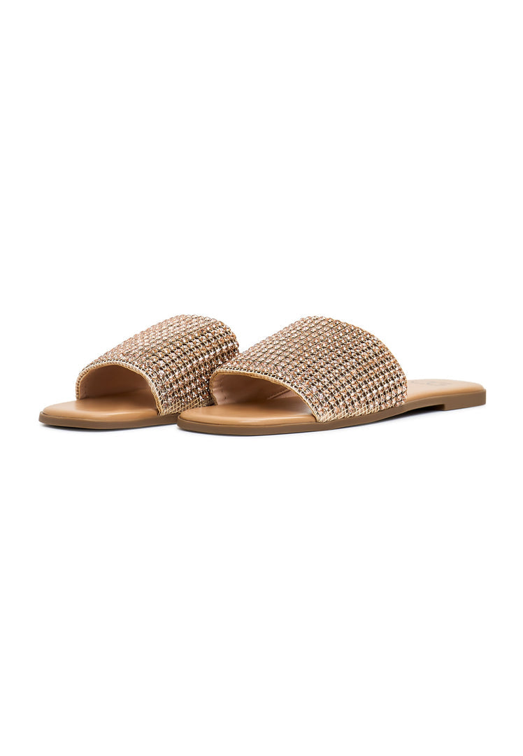 A pair of luxurious gold Izzy flat sole women's slippers, known for their comfort and style.