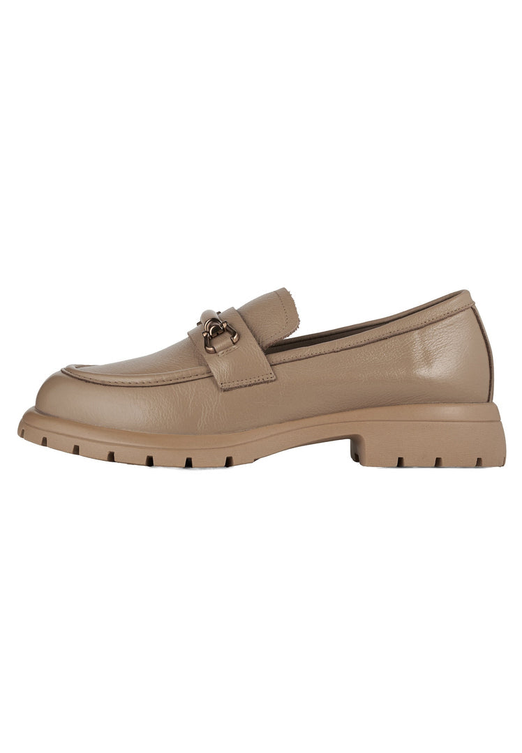 A pair of stylish beige leather platform loafers for women.