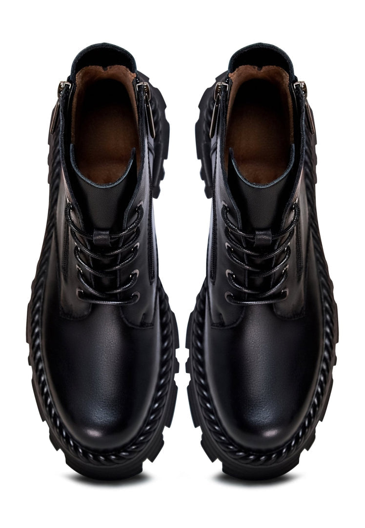 A pair of fashionable lace-up black ankle boots - the perfect stylish choice for any outfit.
