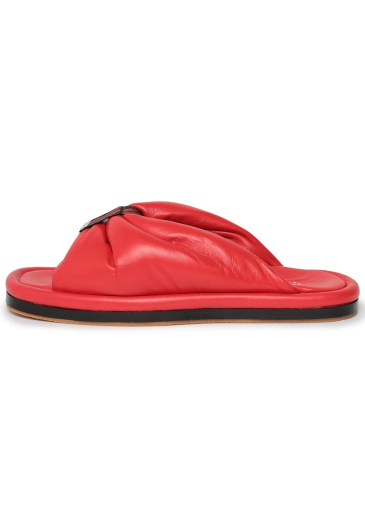A stylish pair of women's open toe flat sole red sandals, perfect for summer footwear.