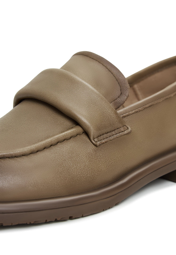 A stylish pair of Stephanie Brown block heeled loafers - A must-have in every woman's fashion footwear collection for comfortable and trendy style.
