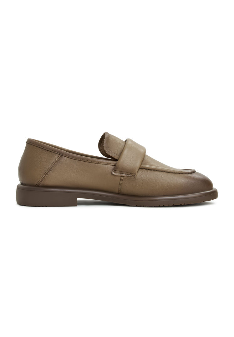 A stylish pair of block heeled loafers by Stephanie Brown Shoes, perfect for women's fashion footwear. These comfortable loafers are a trendy choice for any outfit.