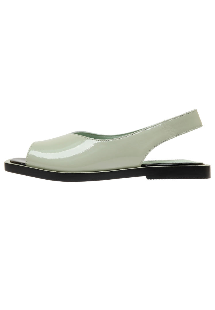 A pair of stylish open toe leather sandals, perfect for summer, urban fashion wear.