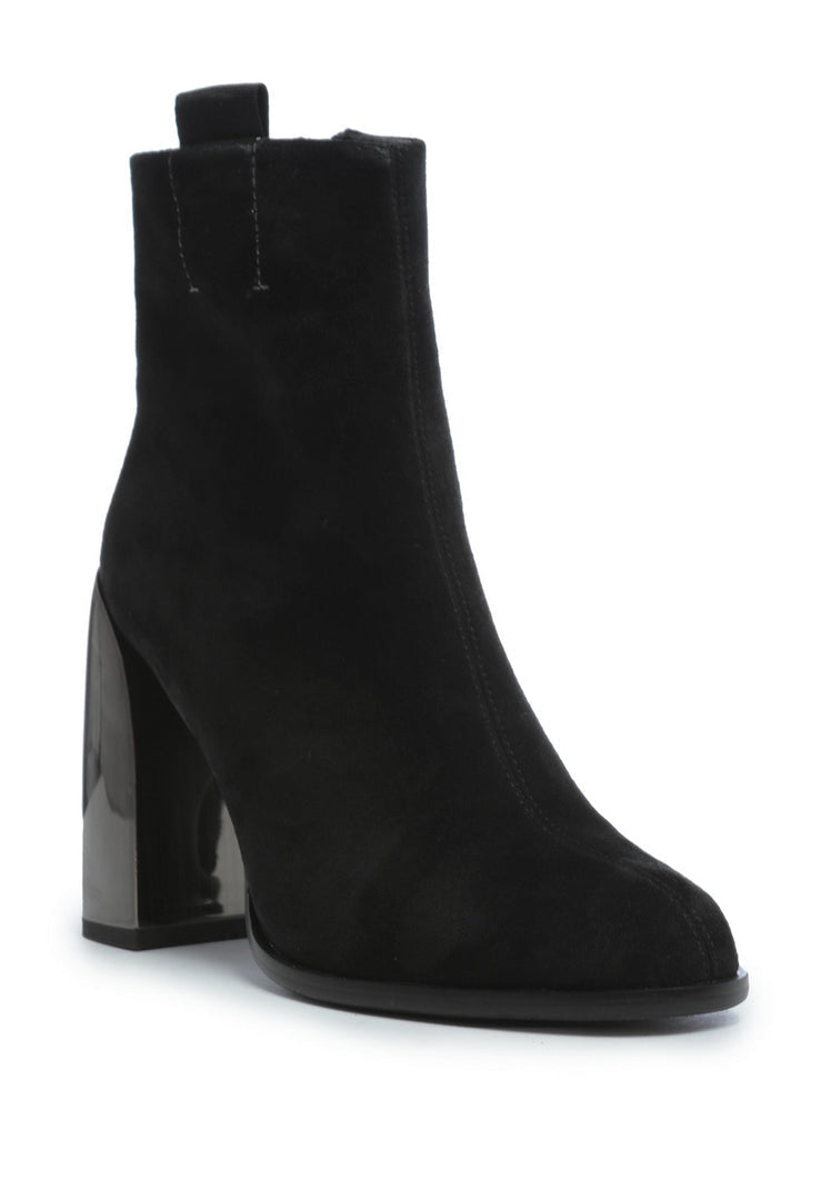 A pair of stylish black suede ankle boots with a trendy square heel design for women.
