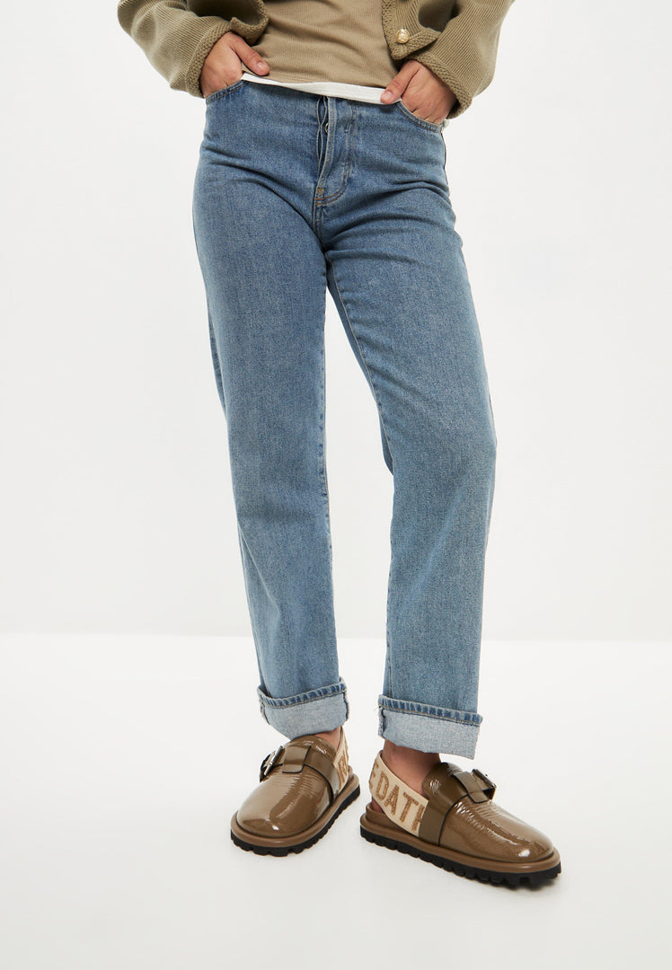 A pair of women's platform slingback Renata slippers in khaki color.