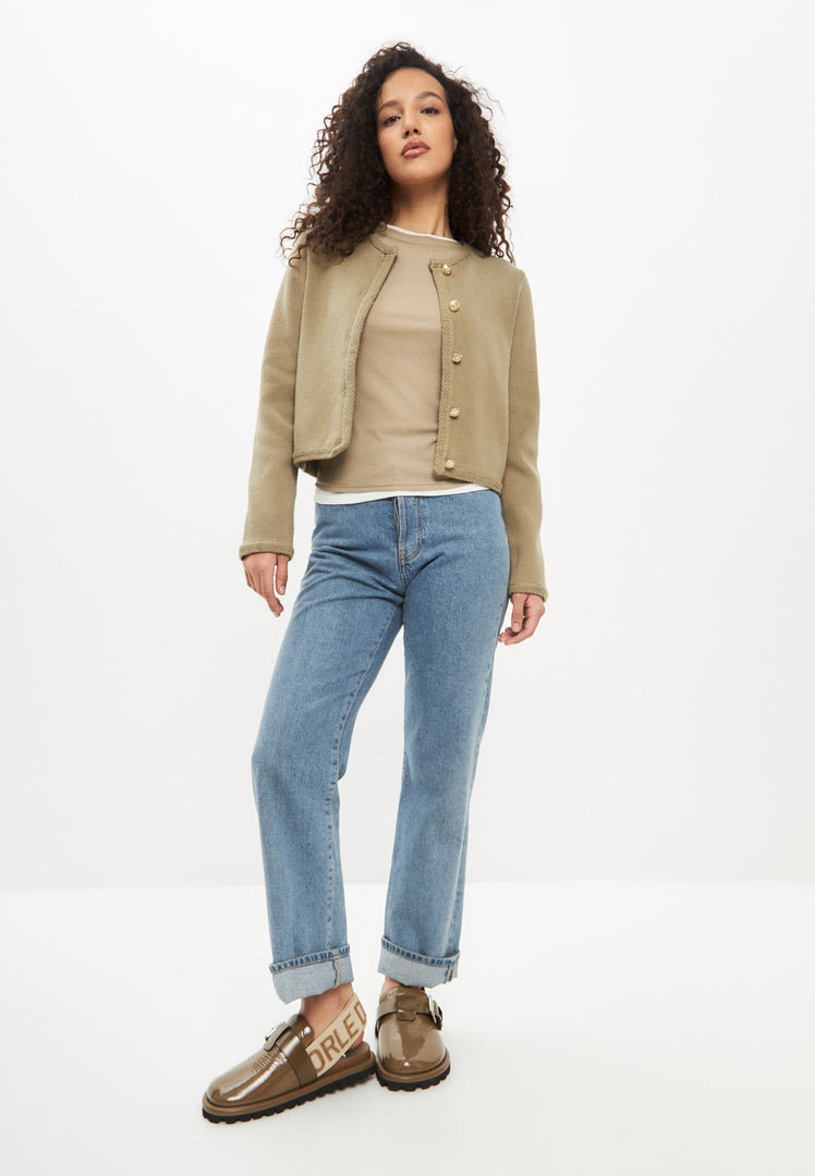 A pair of trendy khaki Renata platform slingback slippers for women.