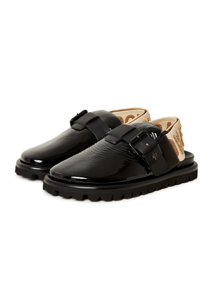 A stylish pair of black Renata platform slingback slippers for women.