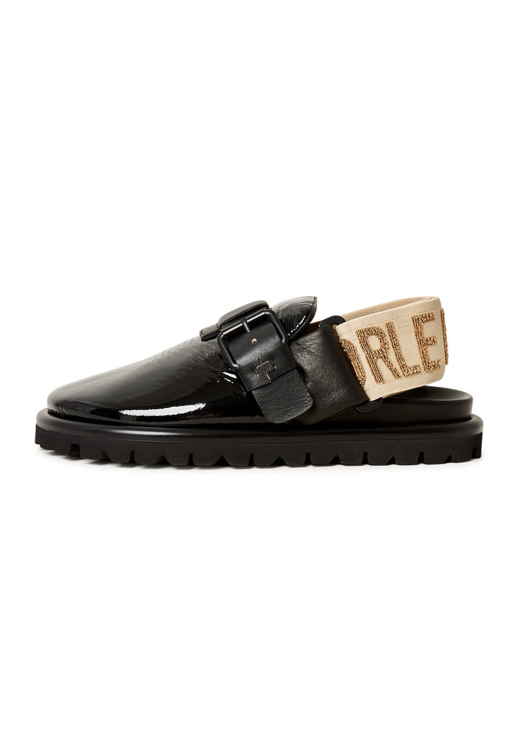 A chic pair of black Renata platform slingback slippers for women.