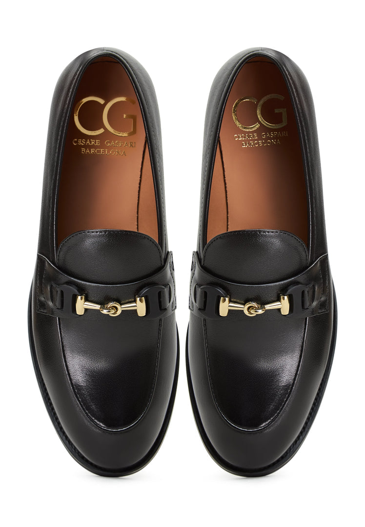 Fashionable black leather platform Olya loafers, perfect for a stylish and comfortable look.