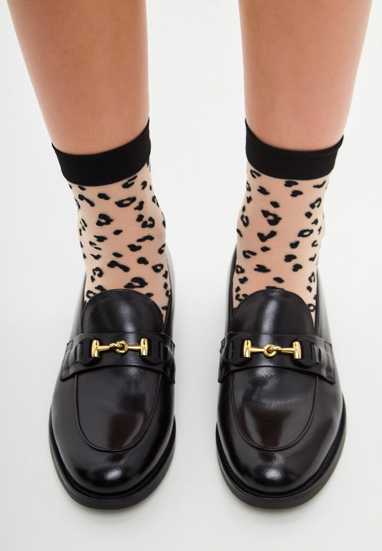 A stylish pair of black leather platform Olya loafers with a modern design perfect for any outfit.