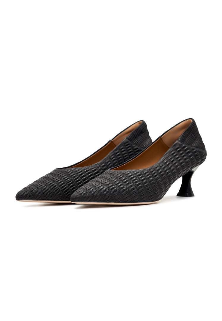 A close-up image of black Carol stiletto pumps, a classic choice for women with sleek stiletto heels and a timeless design.