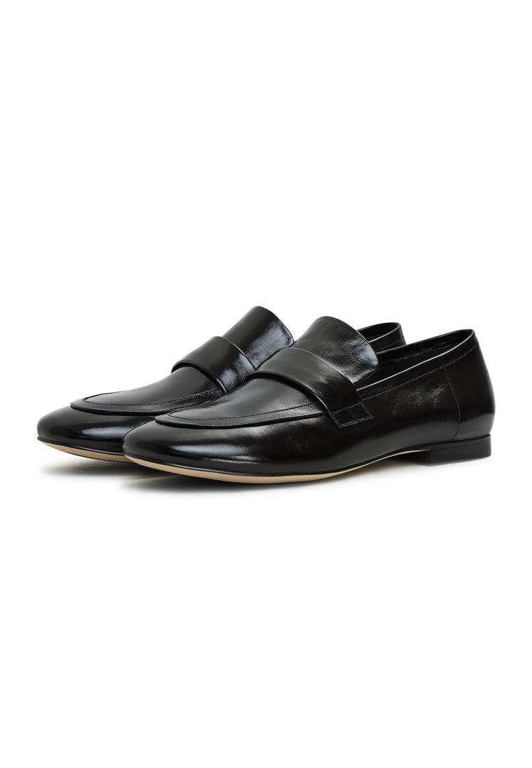 A chic pair of black Diana block heeled loafers, perfect for women's fall fashion wardrobe.
