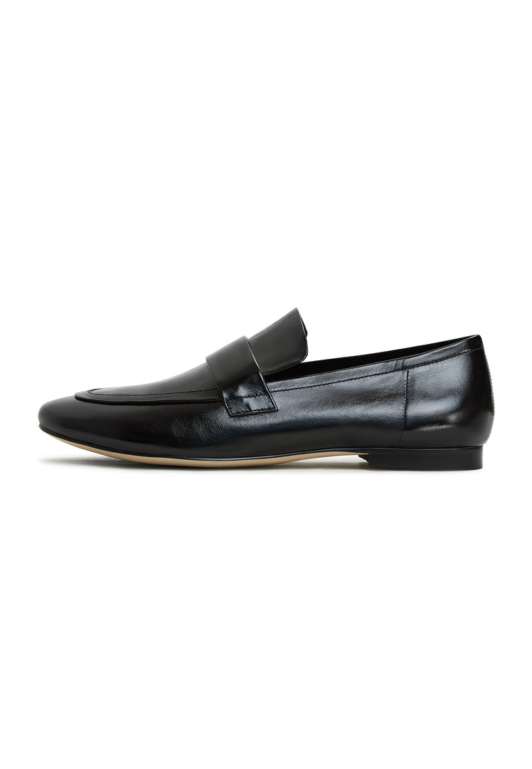 A stylish pair of black Diana block heeled loafers for women, perfect for adding a chic touch to your fall fashion shoe collection.