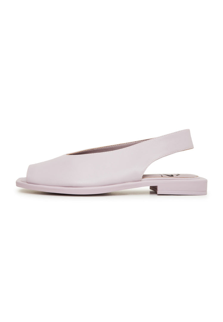 A pair of stylish violet flat sole women's sandals, perfect for summer and beach wear.