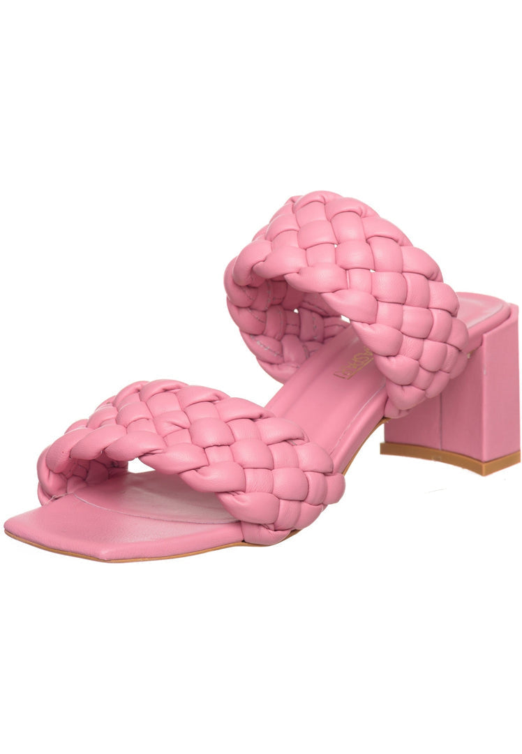 A trendy pair of pink strappy heeled sandals with braided details, perfect for summer.